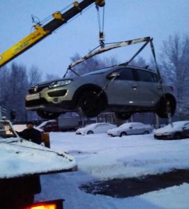 погрузка автомобиля в машину